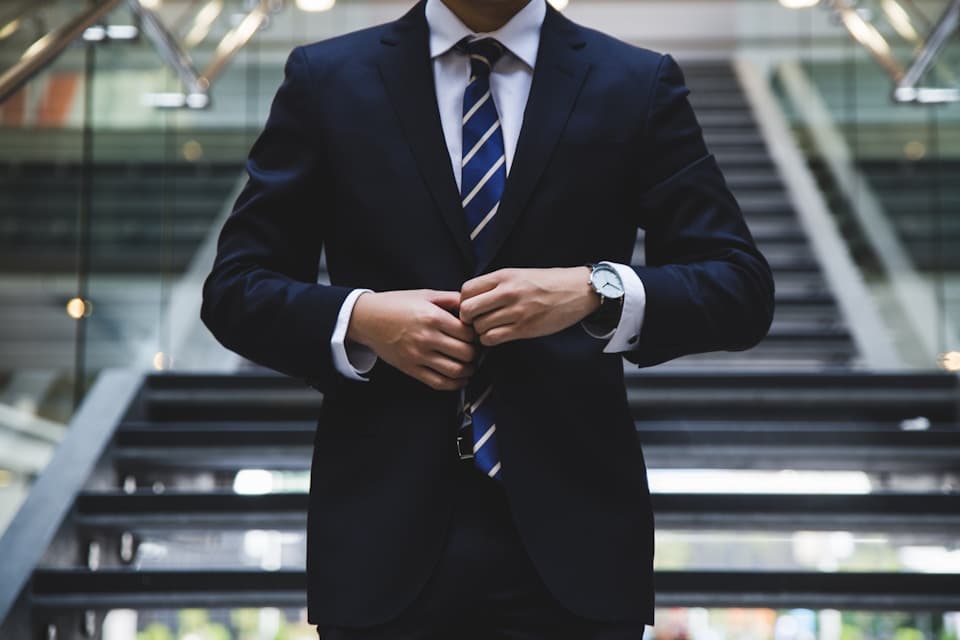 Legal and professional services executive in formal business attire