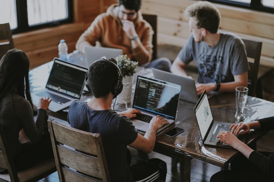 MSP helpdesk team collaborating on client support tickets