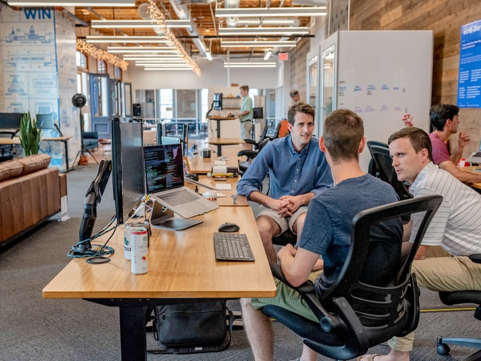 MSP team workshop validating trial pilot results before portfolio rollout